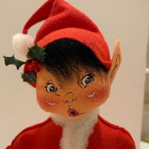 Annalee elf, red suit. 1997 edition.  10” tall in seated position.